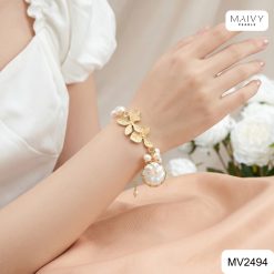 Lắc tay ngọc trai trắng charm hoa lan mạ vàng MV2494